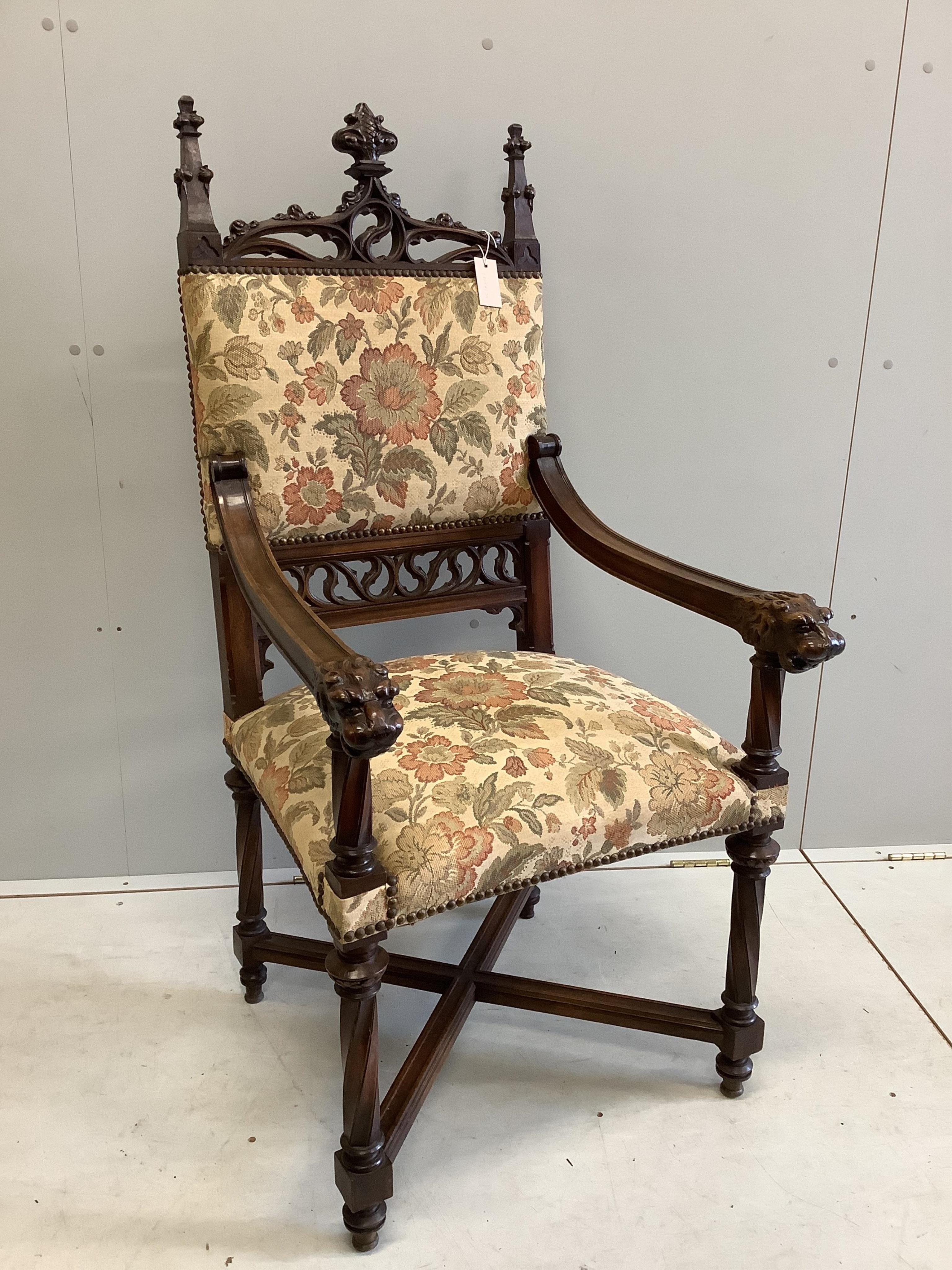 A neo-Gothic carved carved walnut chair, width 60cm, depth 60cm, height 122cm. Condition - fair to good